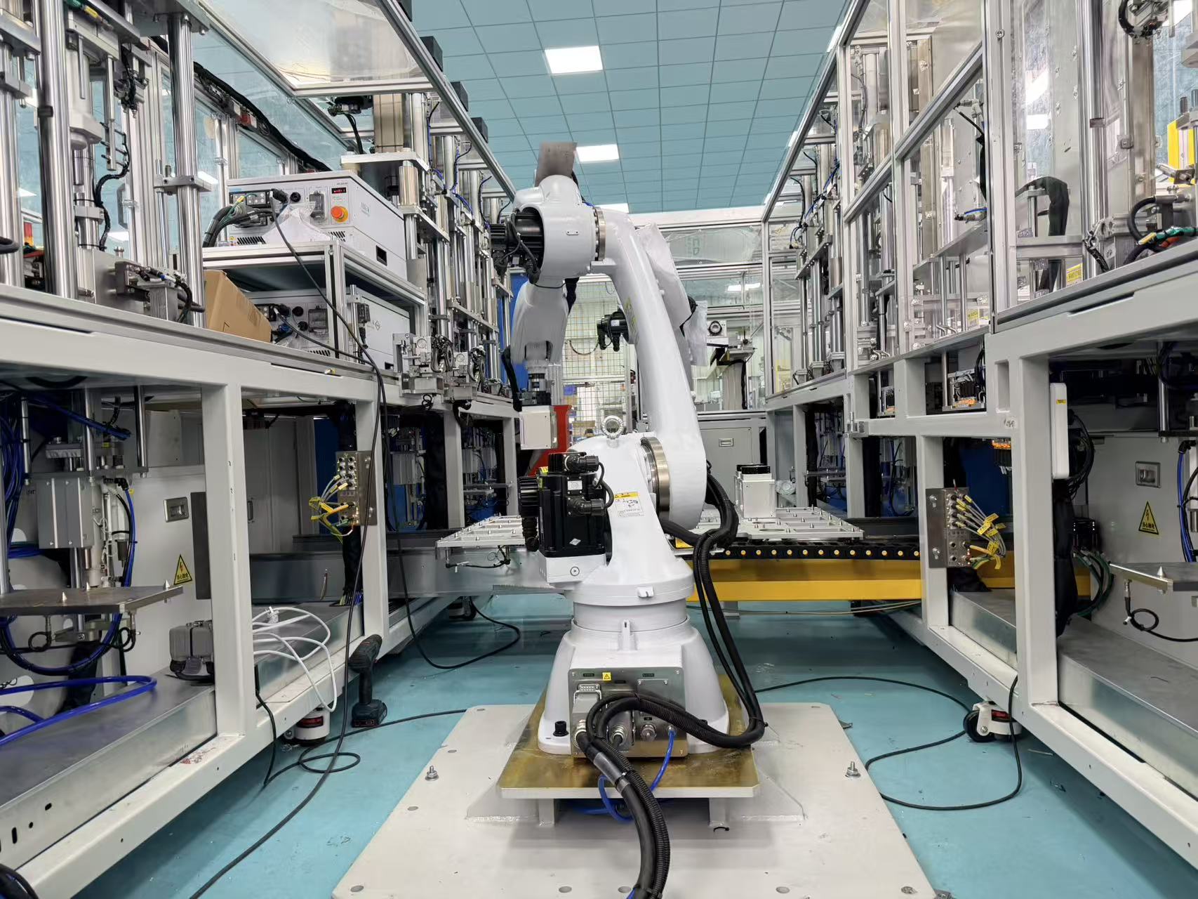 Industrial robot assembly station